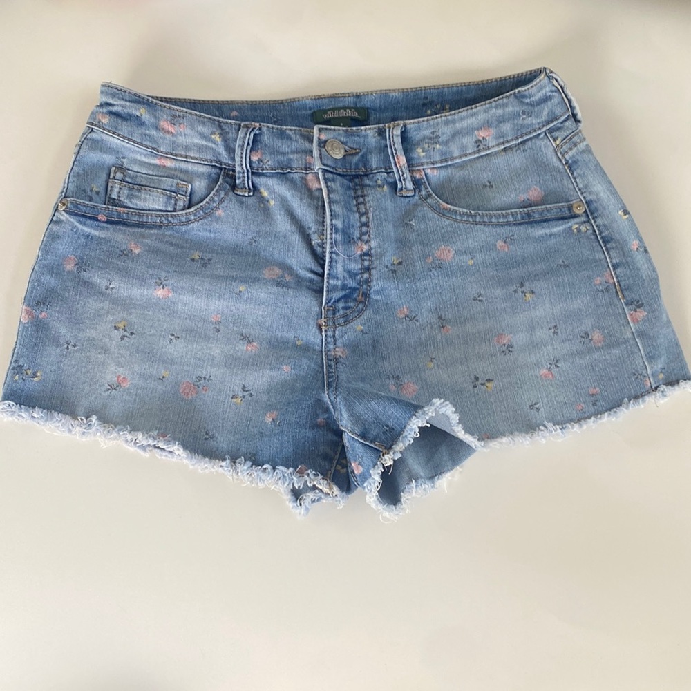 Women’s ripped, flower printed jean shorts